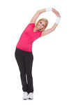 Portrait Of Happy Woman Doing Stretching Exercise